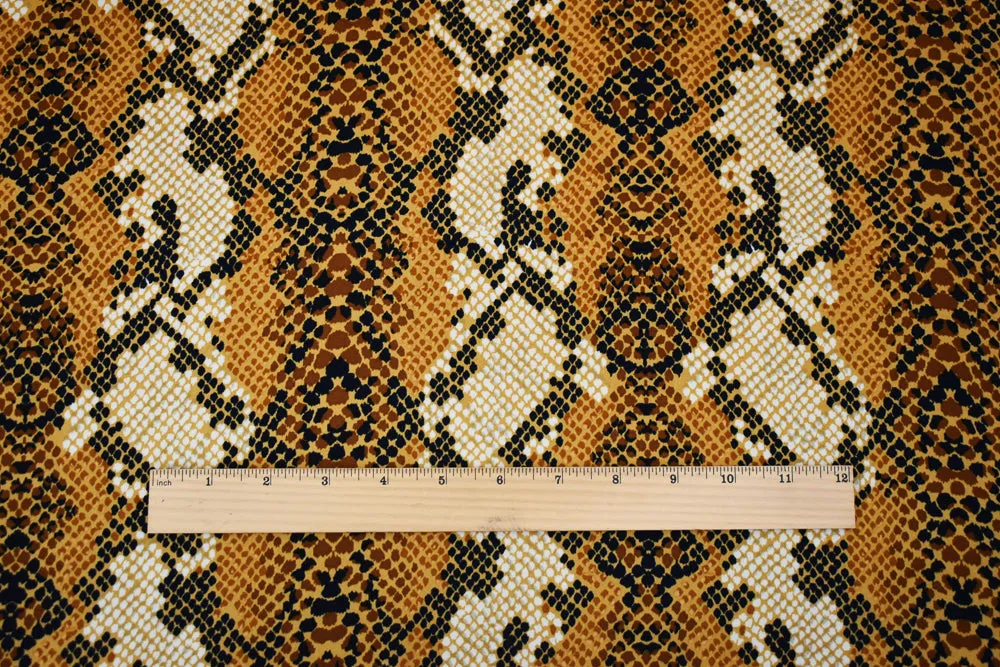 Brown-Tan-Multi Reptile Skin Print Poly Crepe Momie Georgette Woven Fabric